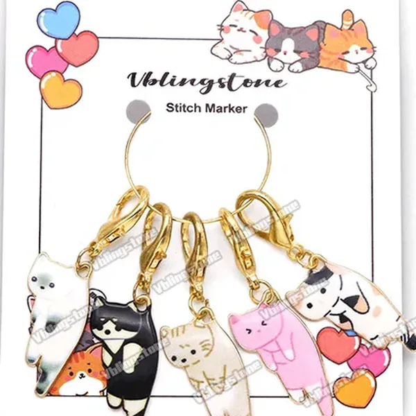 Enamel cat charm stitch markers on gold lobster clasps, set of five on a display card